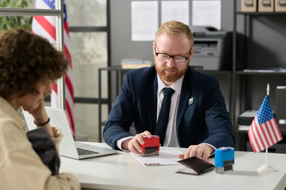 Immigration consultant assisting client with application process