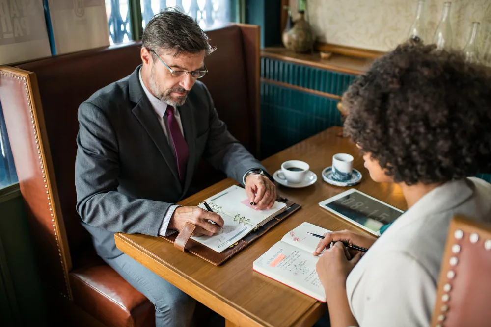 Immigration Lawyer consulting with a client
